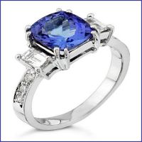 platinum ring with diamonds and sapphire center platinum ring with diamonds and sapphire center