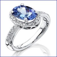 18k white gold ring with diamonds and tanzanite center stone 18k white gold ring with diamonds and tanzanite center stone